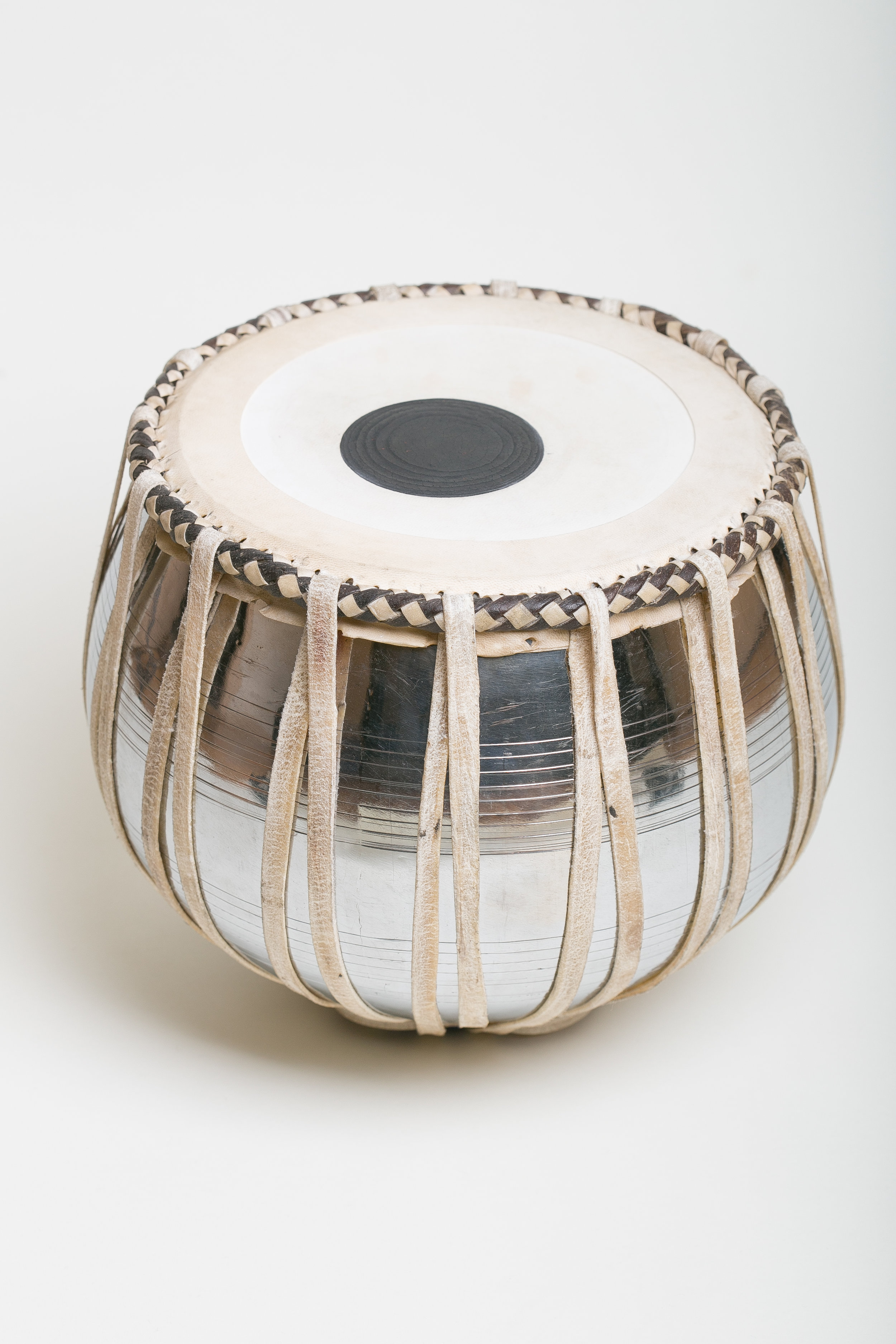A handmade copper bayan bass drum