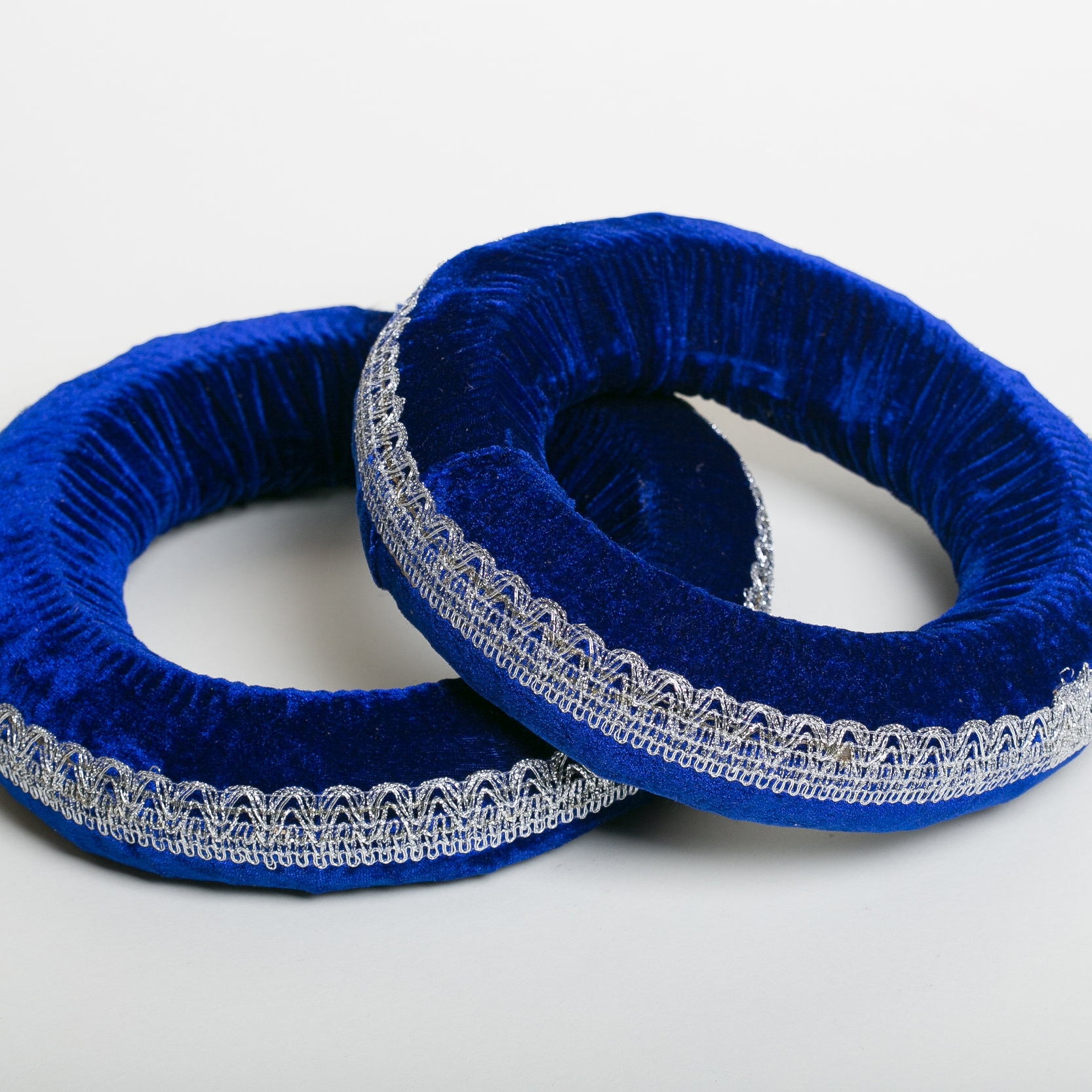 Tabla accessories including rings, covers, and a tuning hammer